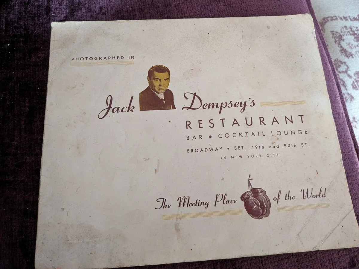Souvenir photograph in its original presentation folder.