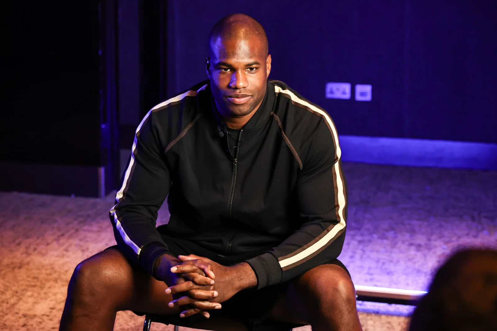 Daniel Dubois seated for a studio interview